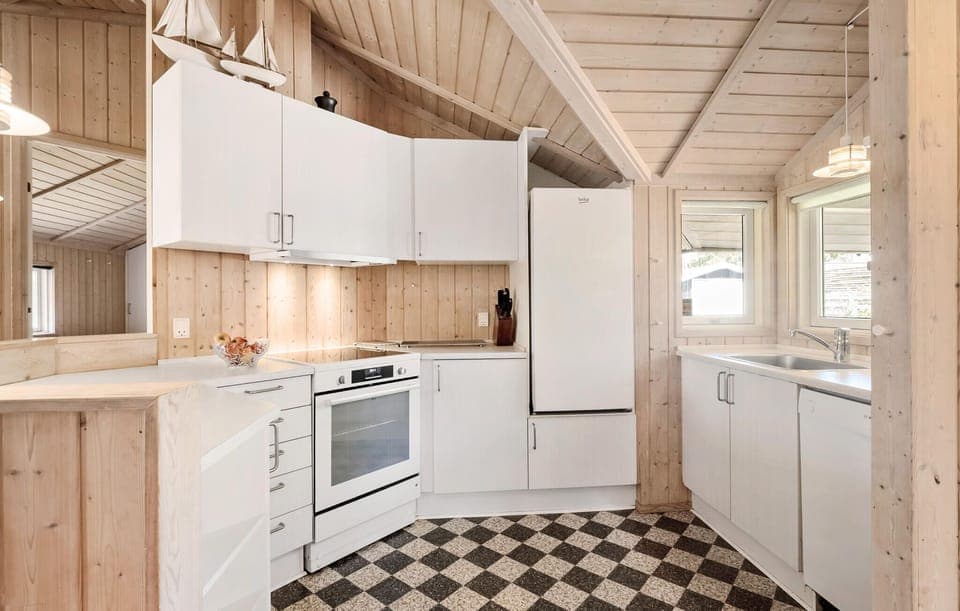 Fridge, stovetop, dishwasher, coffee/tea maker