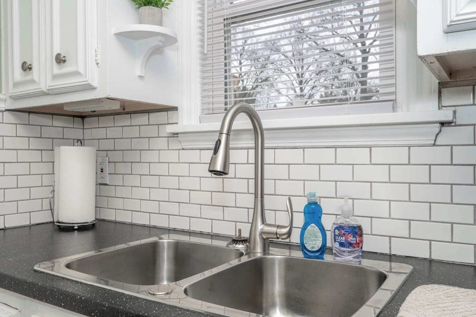 The serene kitchen is well equipped with everything needed for a great stay