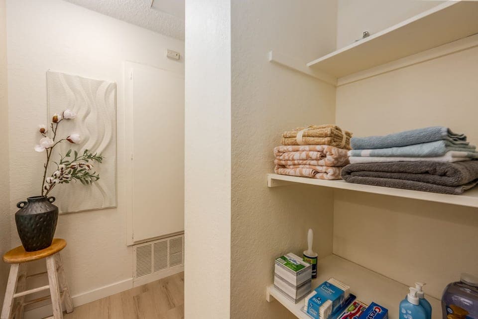 Guest closet stocked with fresh towels, toiletries and all the essentials.