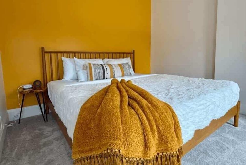 Wake up in Bedroom at our premium Columbus Airbnb where every detail is designed for comfort and elegance! Enjoy a restful sleep in a space that feels like home 