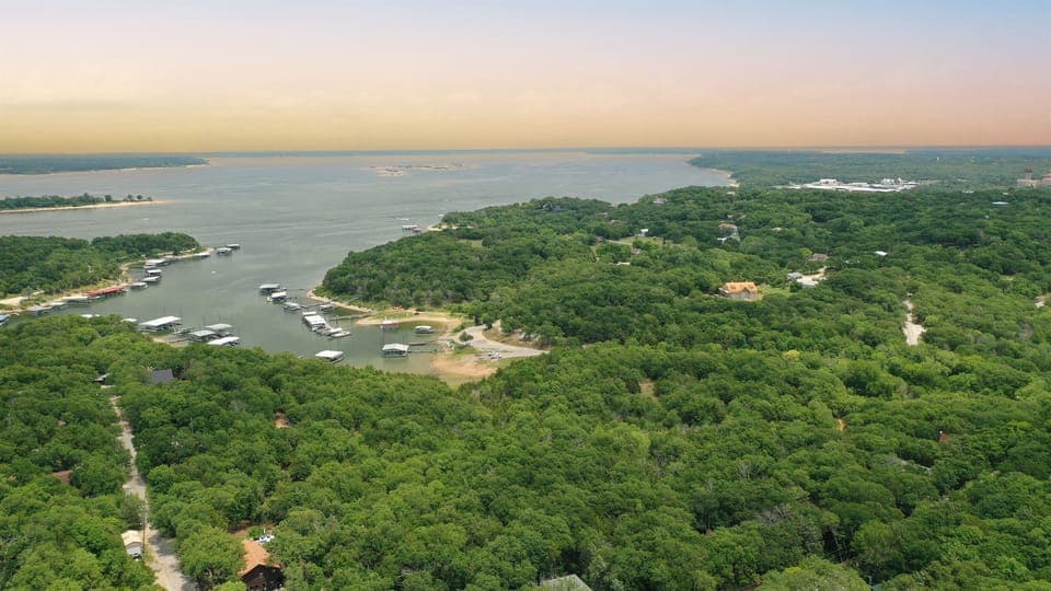 Neighborhood Lake Access & Boat Ramp - 0.3 mile and Highport Marina in distance | *Lake water clarity and levels fluctuate throughout the year, which affects the appearance of the shoreline.