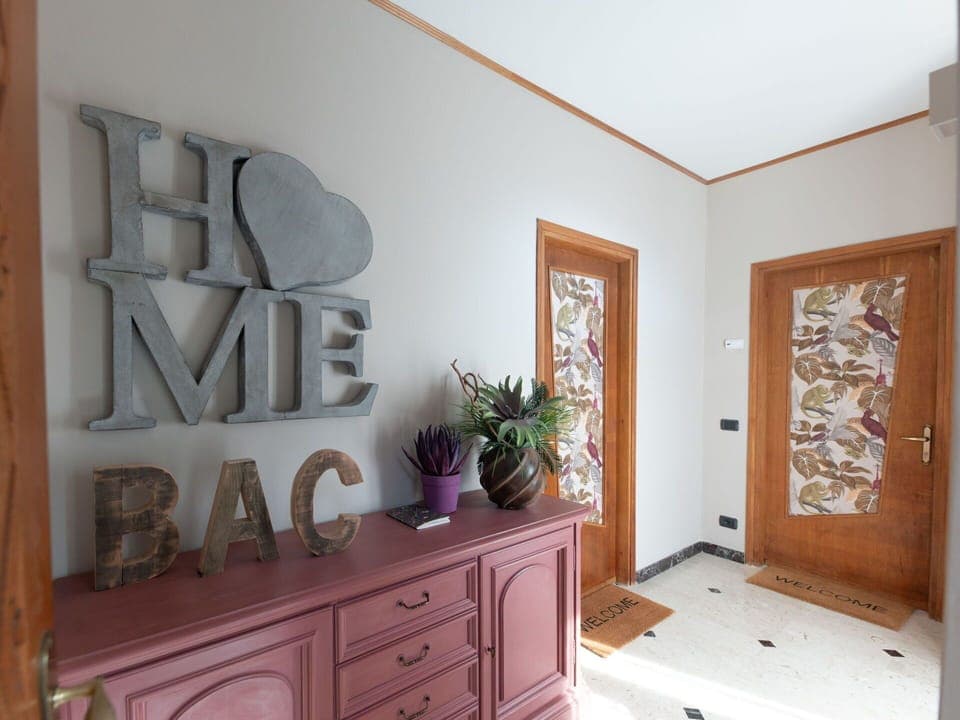 Wall, Interior Design, Flooring, Wood, Floor, Furniture, Lighting, Home, Room, Door