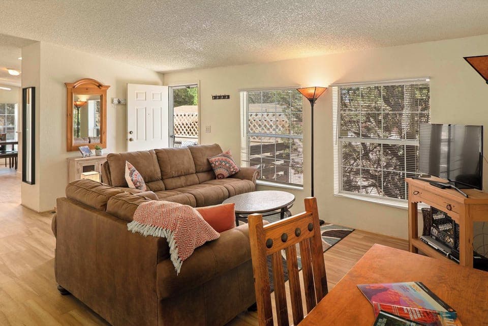 Enjoy the cozy ambiance of our living room with TV.