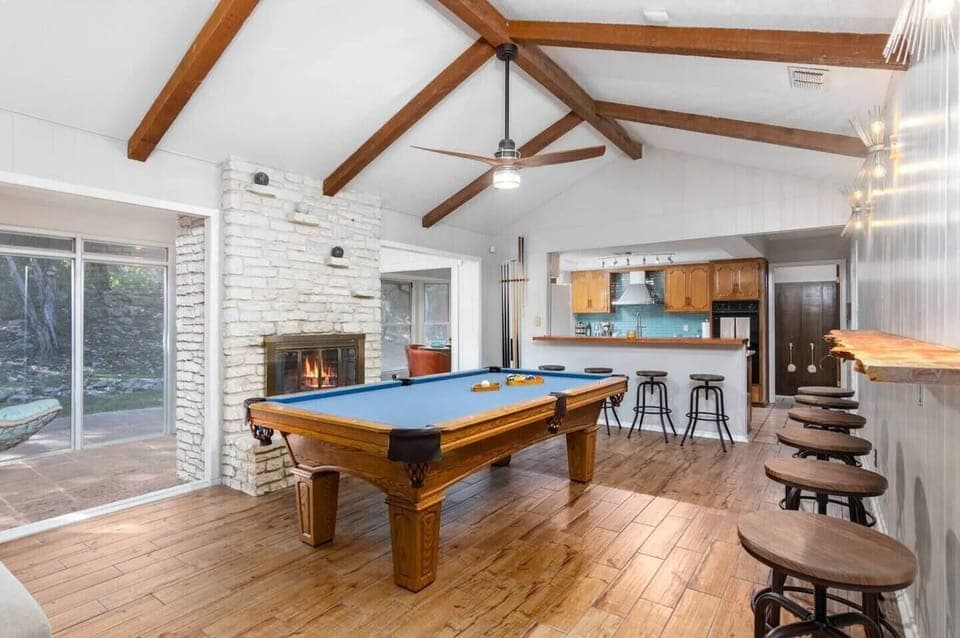 Game room open to the kitchen and dining space