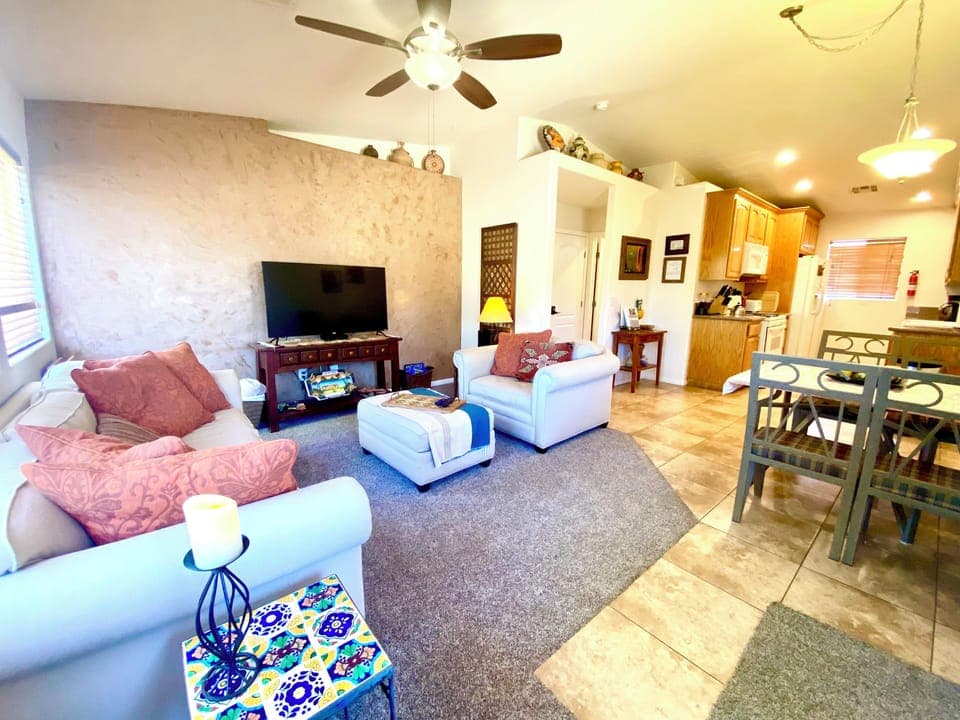 Comfy and entertaining living room space.
Open floor plan for kitchen & dining. 