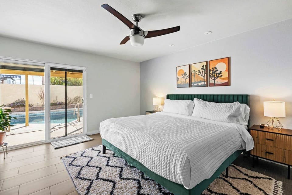 This king suite features a walk-in closet and direct access to the patio and pool area