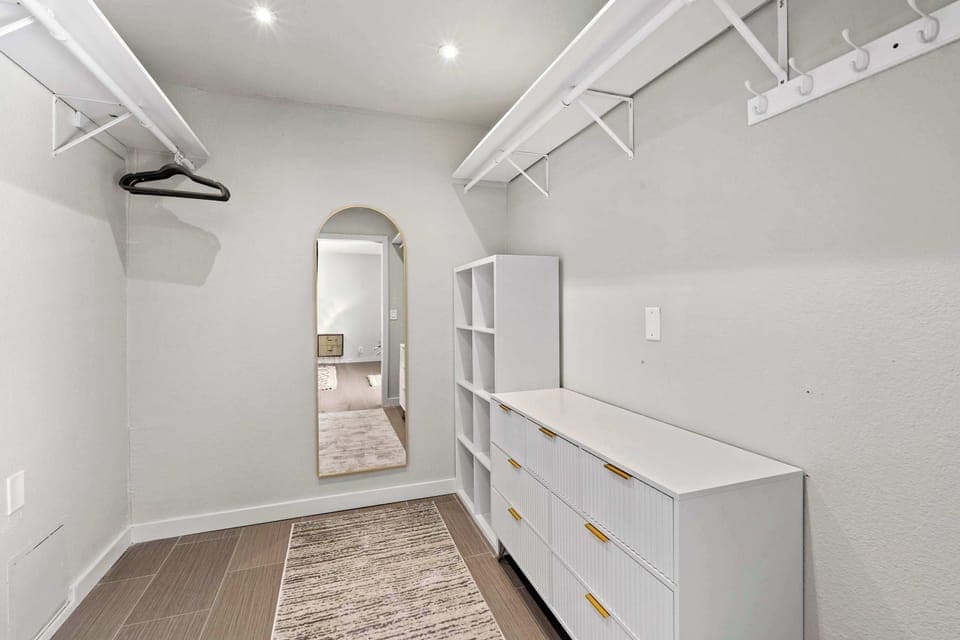 This king suite features a walk-in closet and direct access to the patio and pool area