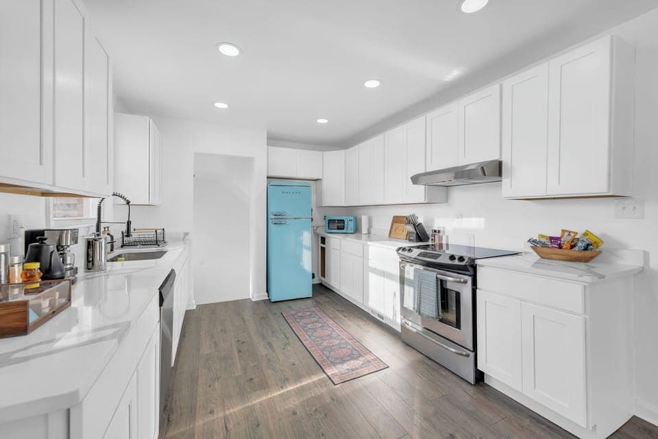 Spacious kitchen fully equipped for baking and cooking. Coffee and snack bar. 