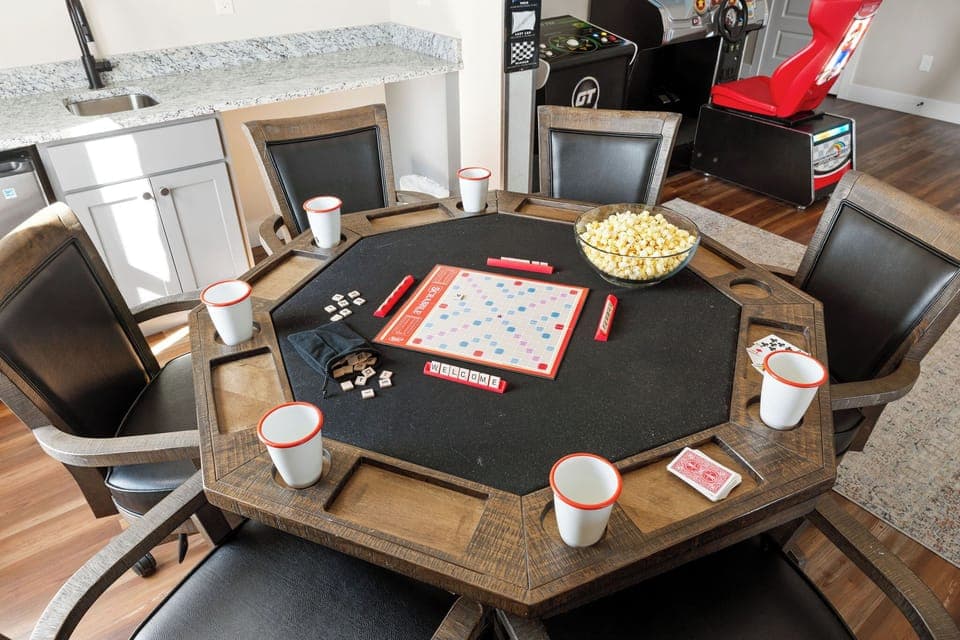 - Game night is ready with a cozy setup for Scrabble, cards, and laughs around the table
- Enjoy popcorn, drinks, and friendly competition with everyone gathered
- Space made for fun chats, playful rivalries, and great memories ahead