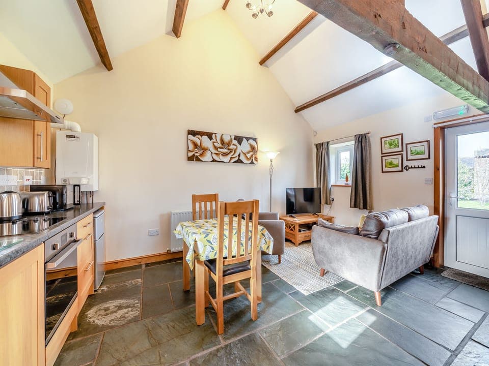Open plan living space | Eight Byre - Dickinson Place Holiday Cottages, Allonby