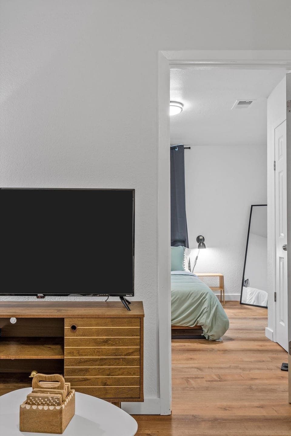 Full size mirror and top rated queen size mattress. Rest well at the end of the day!