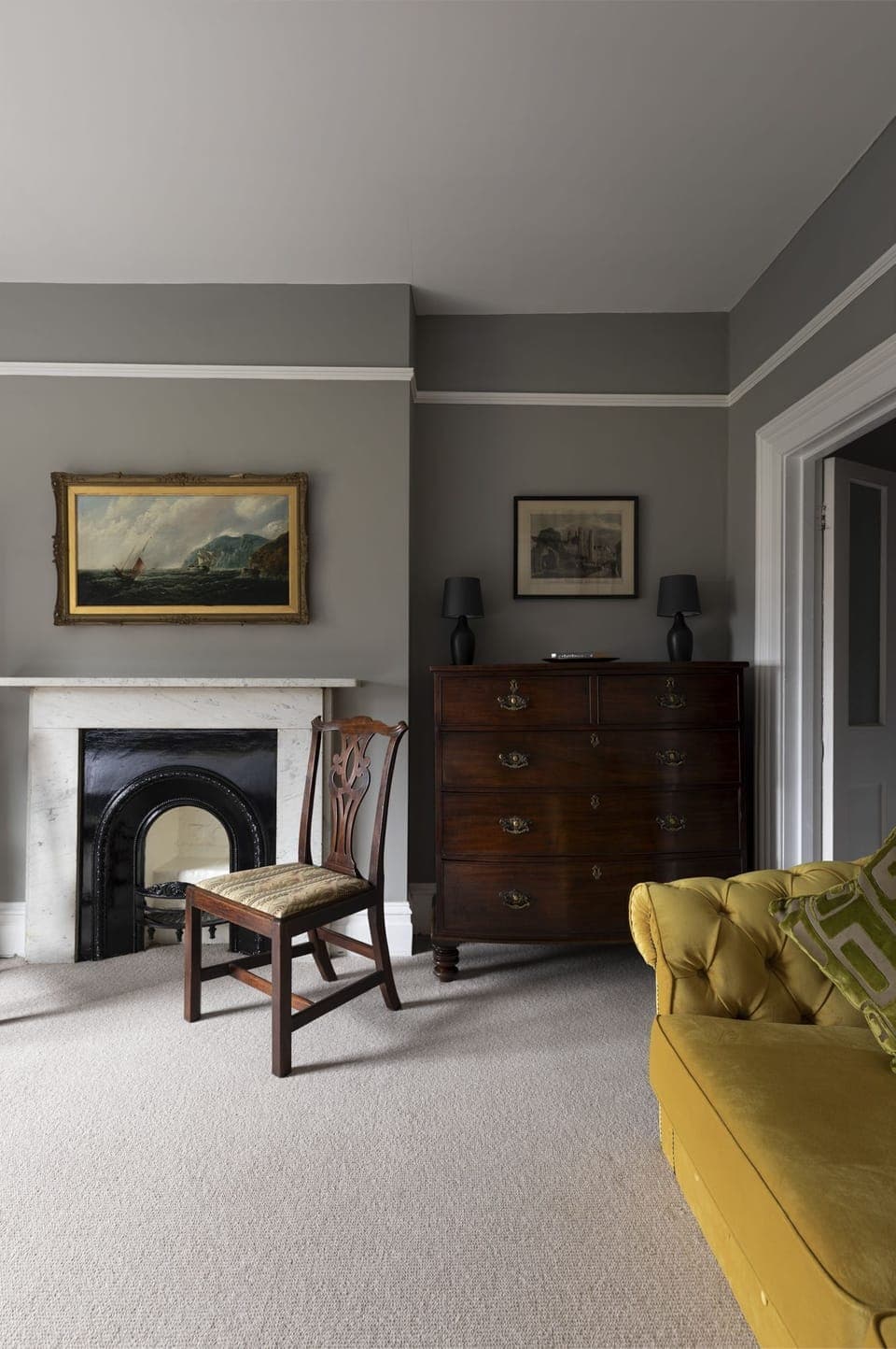 The Clarence - antiques and original paintings in bedroom two