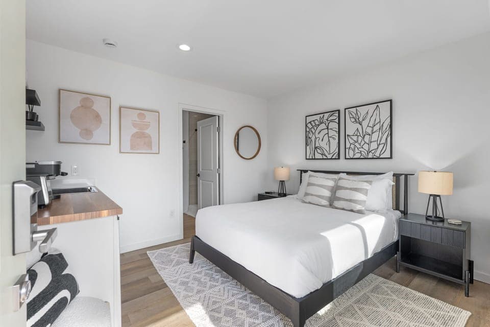 This modern, well equipped kitchenette with a small fridge, microwave, toaster oven/air fryer combo, and Keurig coffee maker -perfect for effortless meals and morning coffee.