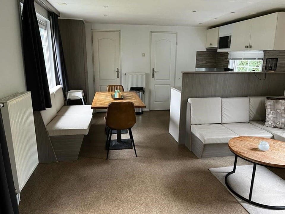 Blue, Chair, Outdoor Furniture, Design, Shade, Outdoor Table, Eco Hotel, Patio, Houseplant, Daylighting