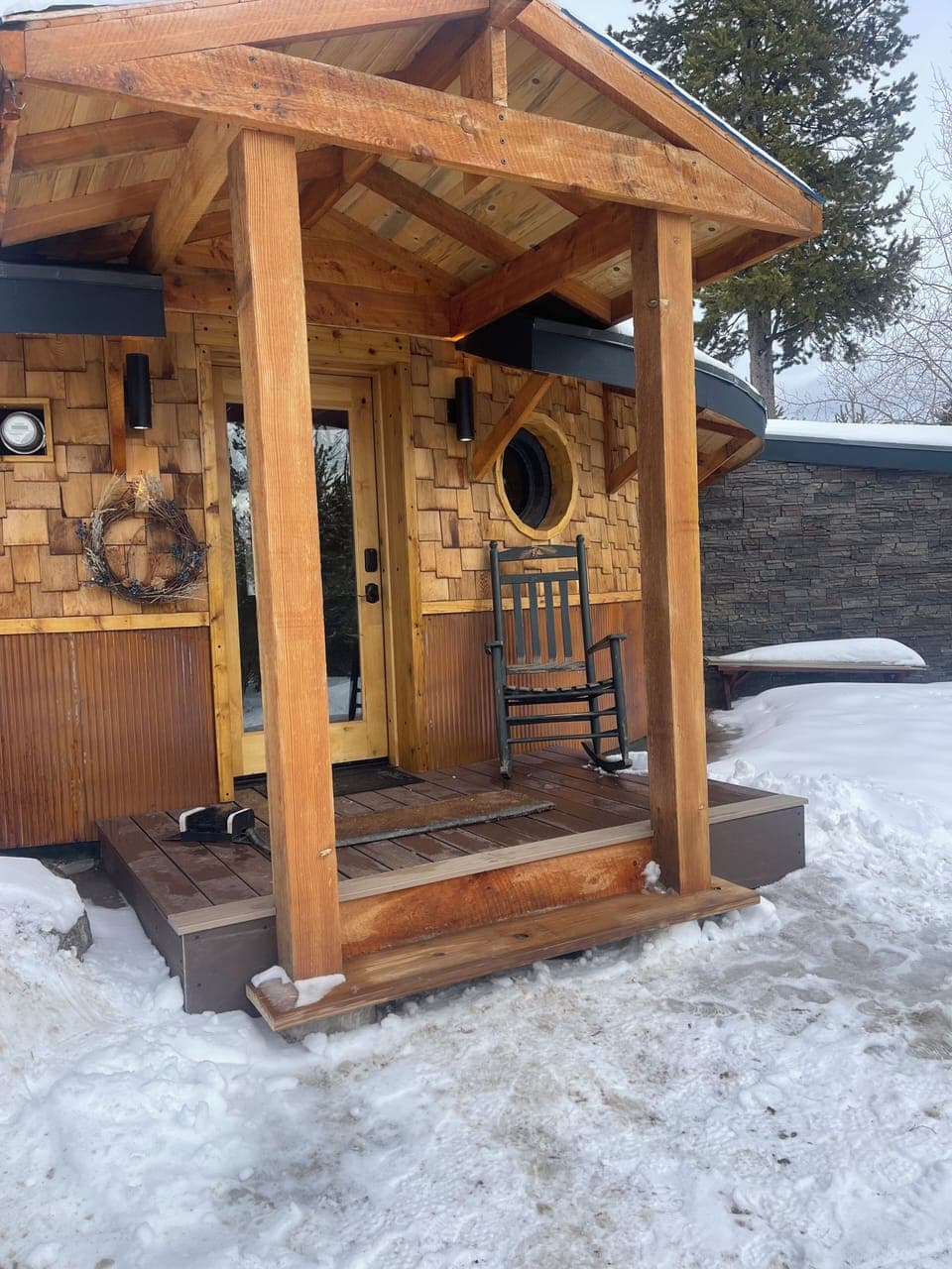 Front porch rocking chair is waiting for you.