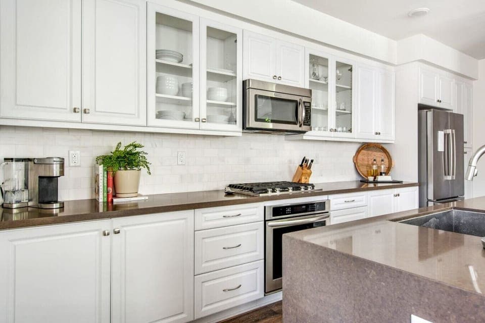 Fully stocked kitchen with cooking utensils
