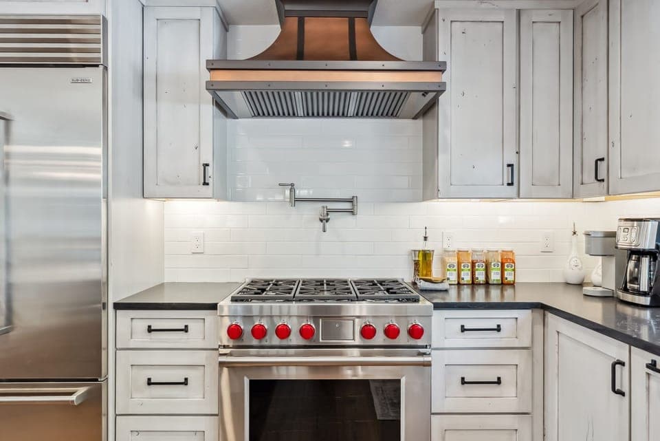 Kitchen: Sub-Zero refrigerator, Wolf oven, Keurig and Cuisinart coffee makers, and fully-equipped kitchen