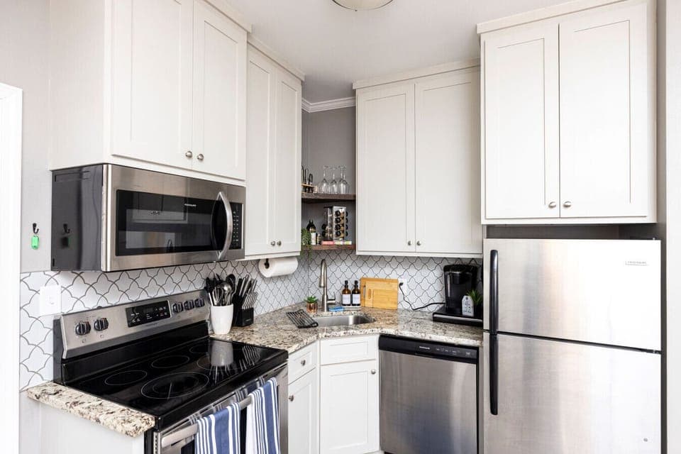 Whip up your favorite meals in our fully stocked kitchen featuring a stainless steel fridge/freezer, stove, oven, microwave, and dishwasher — everything you need for a stress-free stay!