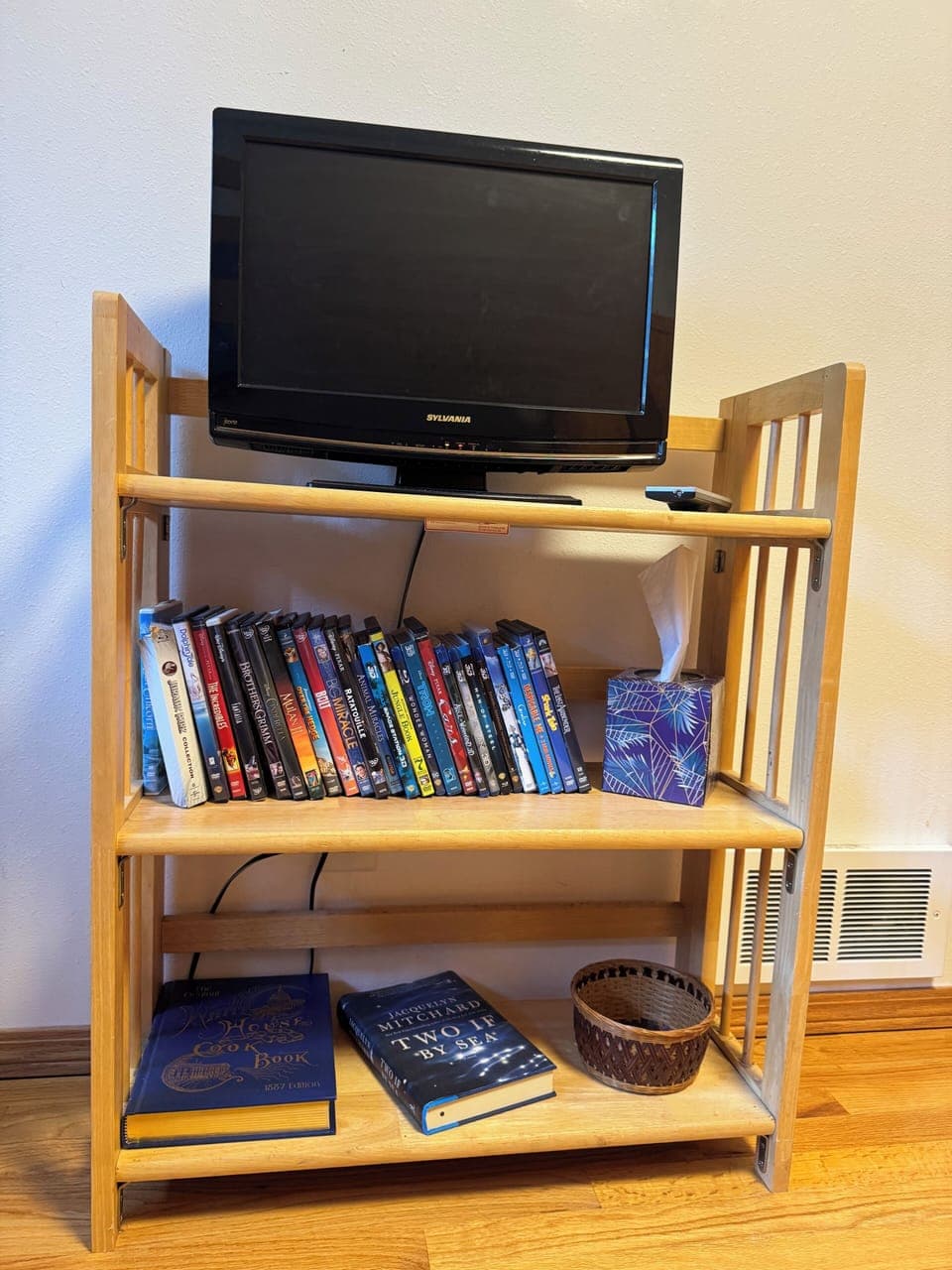 Tv with dvd player in bunk room with dvds provided