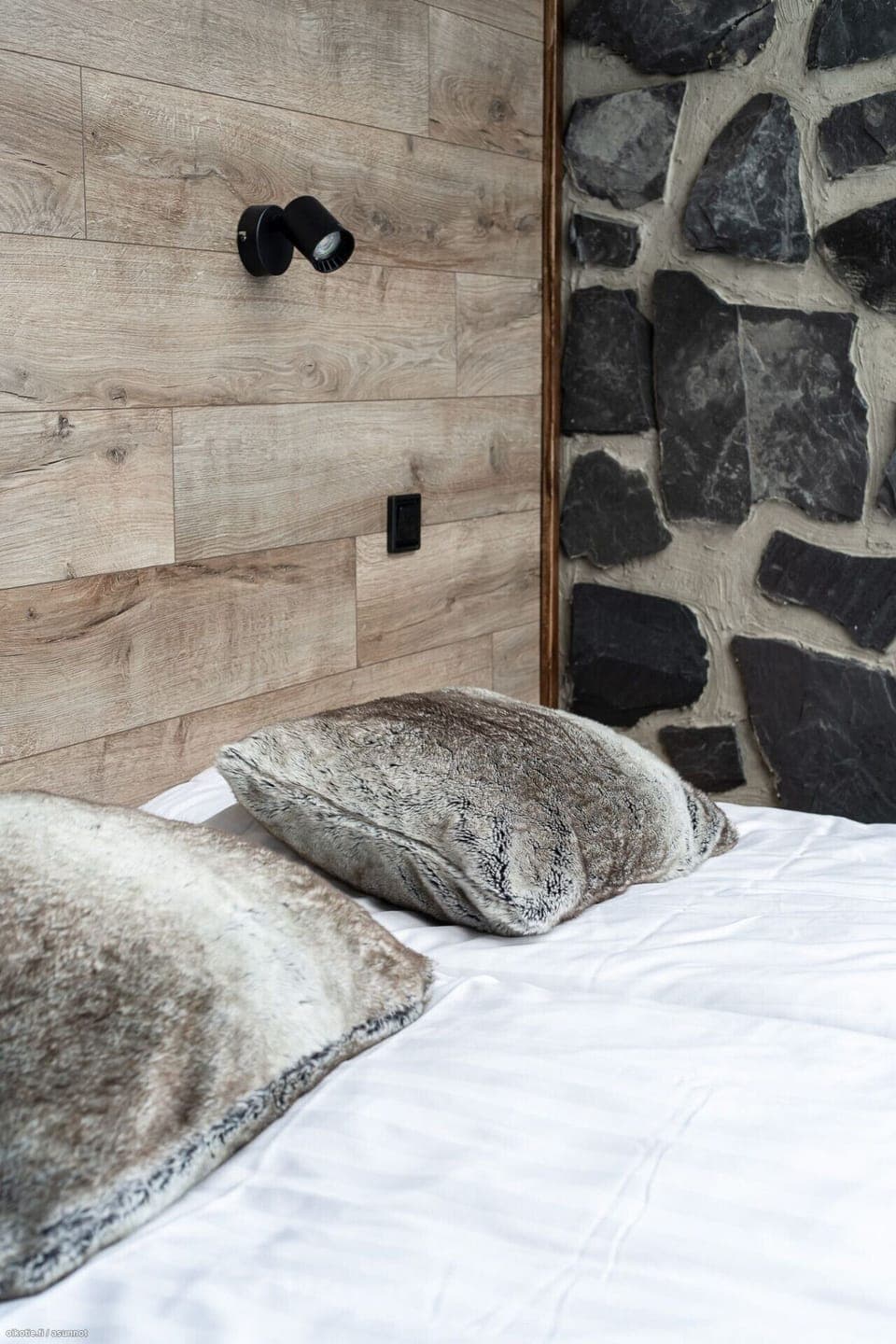 Every detail has been chosen for your comfort, from the plush pillows to the luxurious linens. The unique blend of modern design and natural stone and wood textures creates a peaceful and inviting sleeping environment.