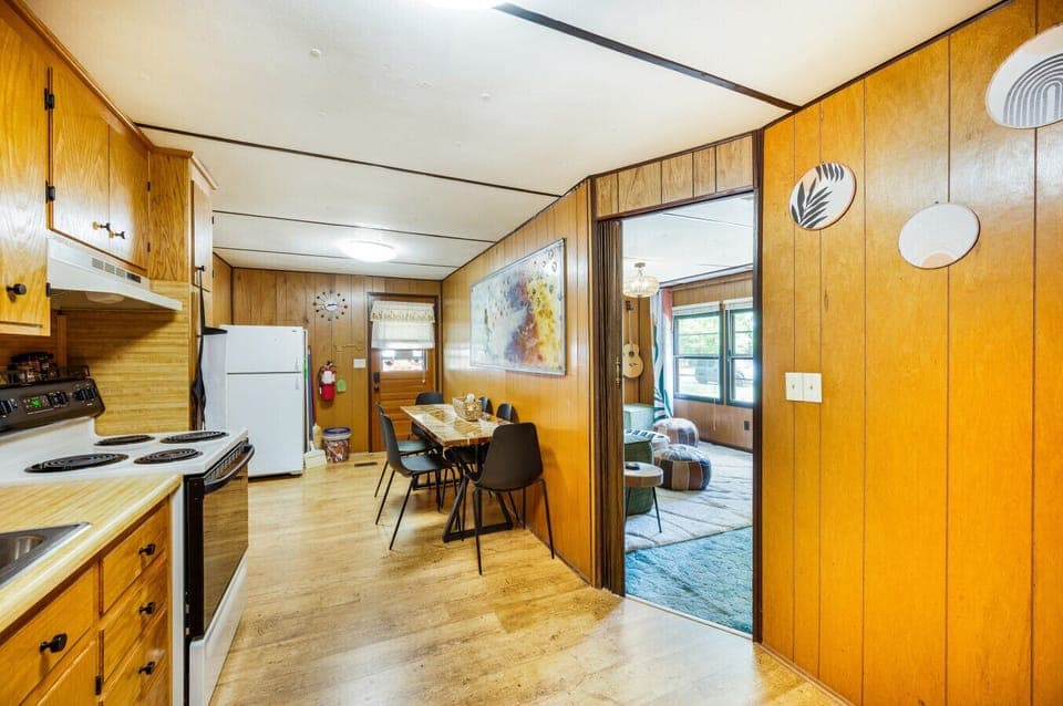 Blended kitchen and dining spaces for ease of access