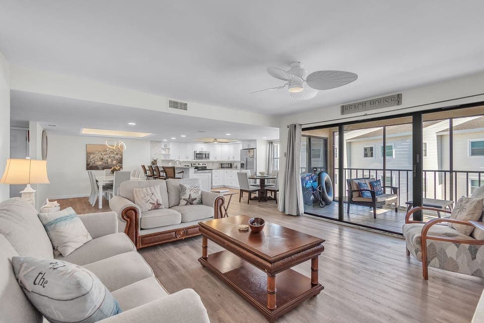 Spacious, Open Living Area with Balcony Access