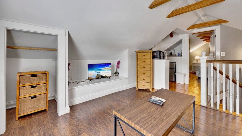 A flat screen TV to keep you entertained in the living...