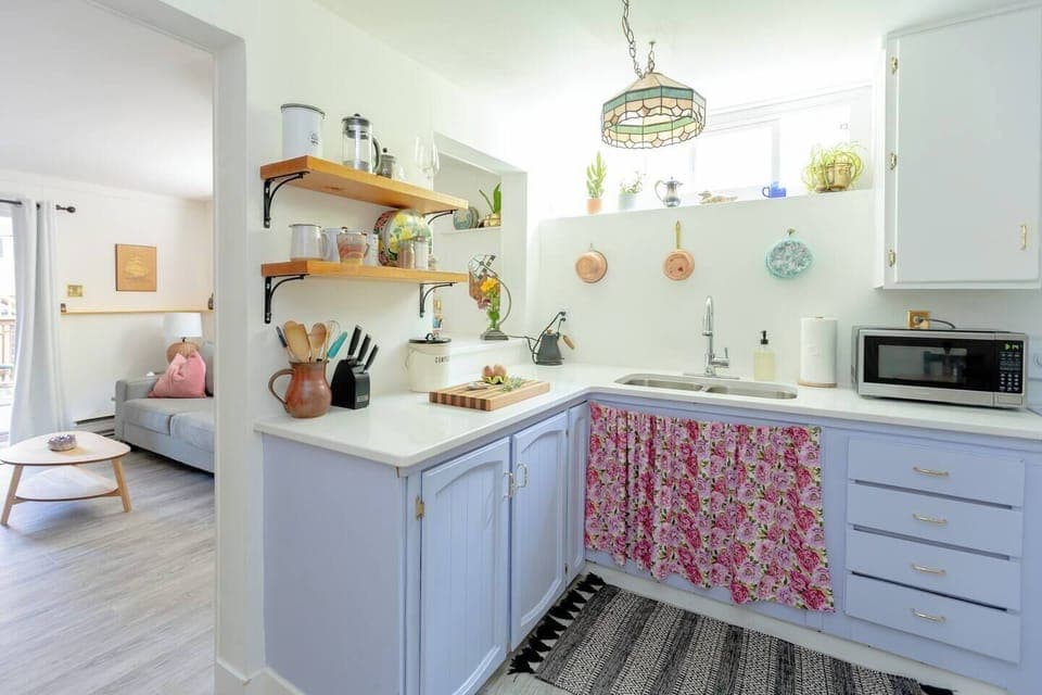 Fully stocked kitchen and dining room (not pictured) connects to the spacious living room