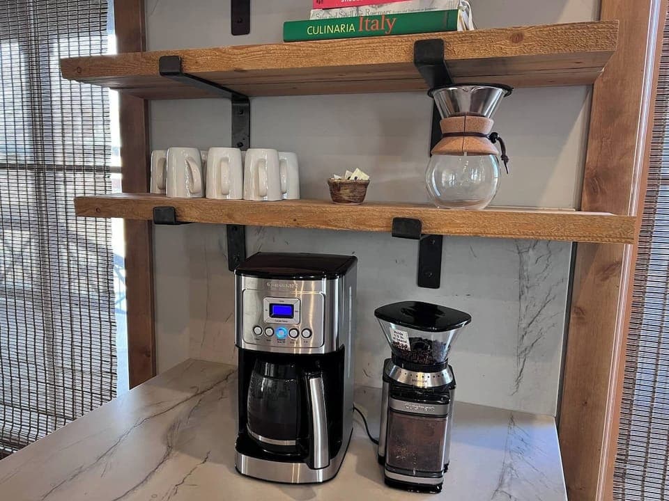 Drip coffee maker, grinder and pour over provided. 