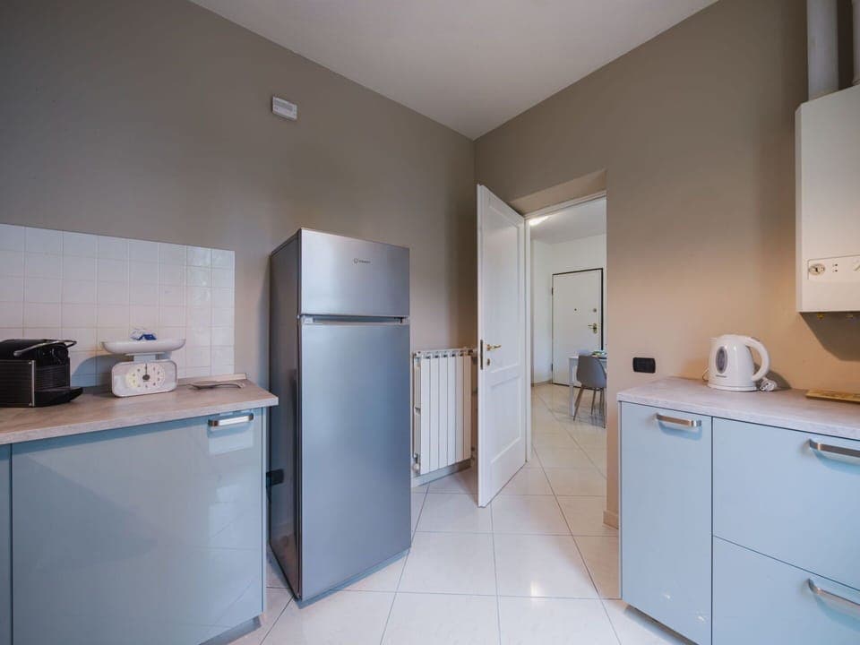 Major Appliance, Flooring, Kitchen Appliance, Interior Design, Cabinetry, Floor, Ceiling, Home Appliance, Kitchen, Lighting