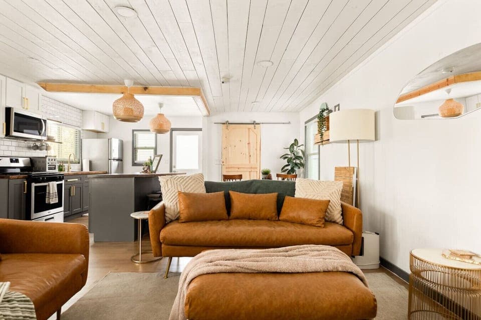 Snuggle up with a blanket and your favorite book or movie in this warm, welcoming space