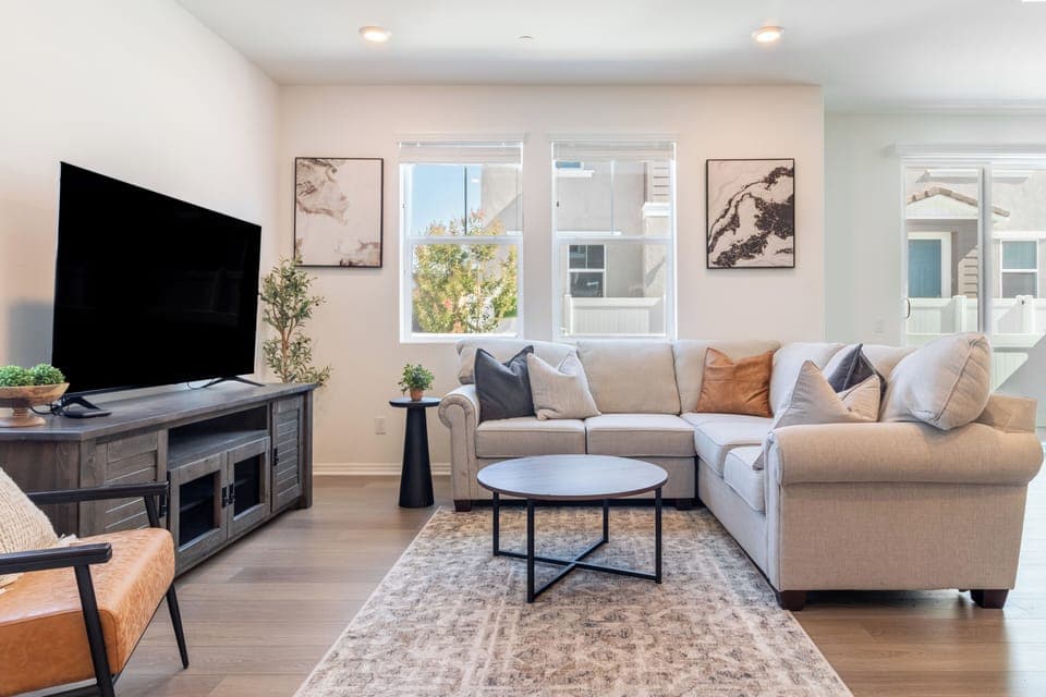 Bright and open Great Room area with Smart TV. 