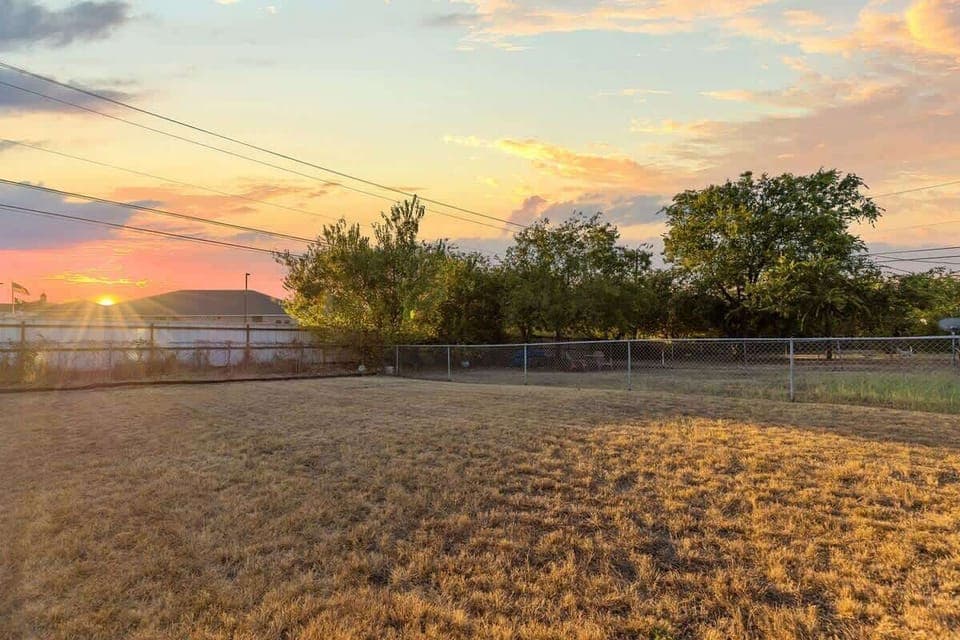 Outdoor Oasis: Enjoy stunning sunset views in your spacious private yard—perfect for gatherings!