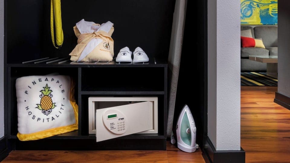Settle in effortlessly with in-room safe and handy ironing setup.