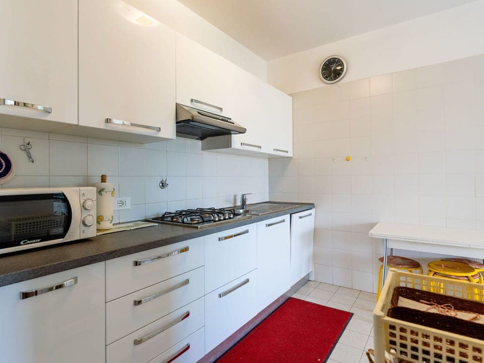 Furniture, Flooring, Home, Floor, Chair, Shade, Apartment, Outdoor Furniture, Houseplant, Kitchen & Dining Room Table