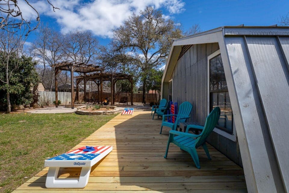 Brand new deck with cornhole and connect four