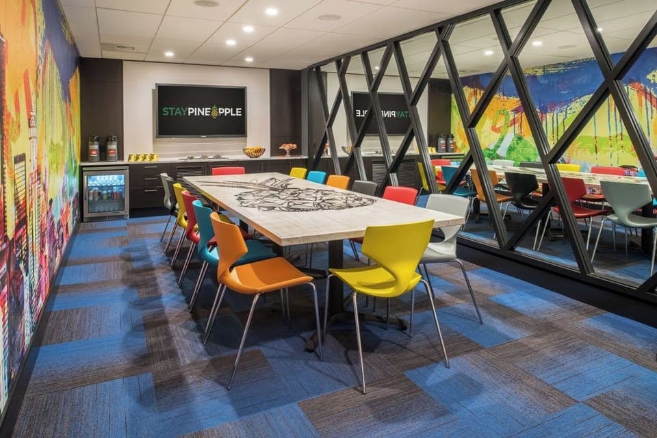 Host ideas around a statement table in a creative meeting room