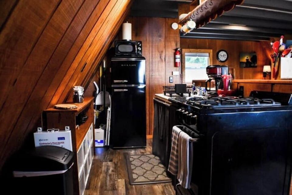 Well stocked kitchen inc: local coffee, teas, spices, pots, pans utensils & more