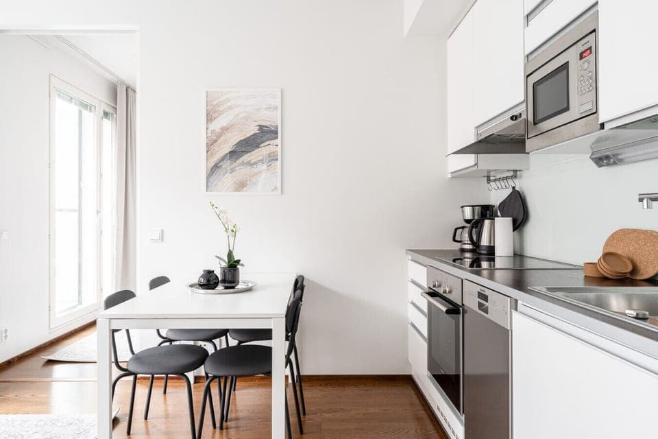 Enjoy the convenience of a fully equipped kitchen, perfect for preparing meals before heading out to a concert or game.