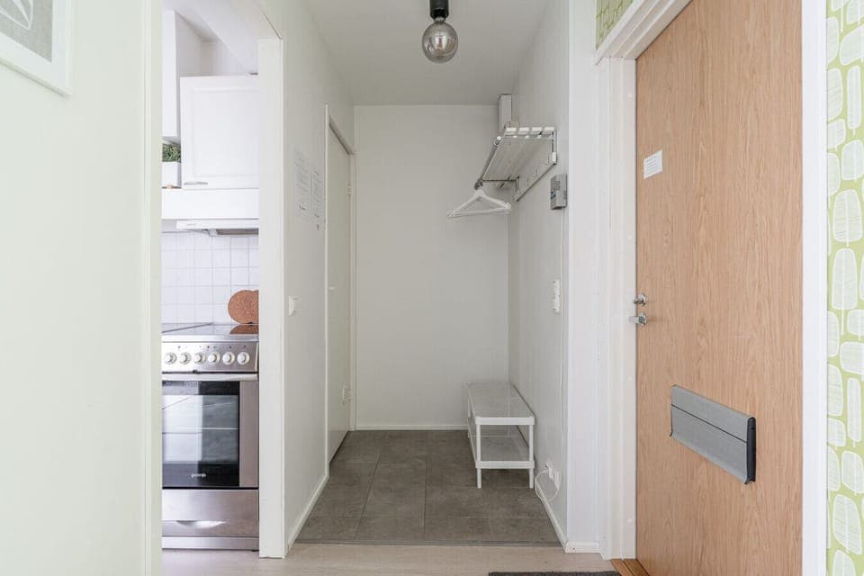 A clean and organized entryway welcomes you with space for your outdoor gear and easy access to all rooms.