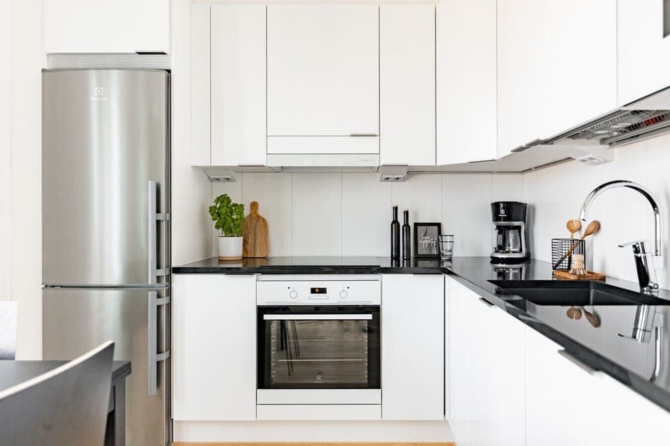 The kitchen is well equipped with cooking ware.