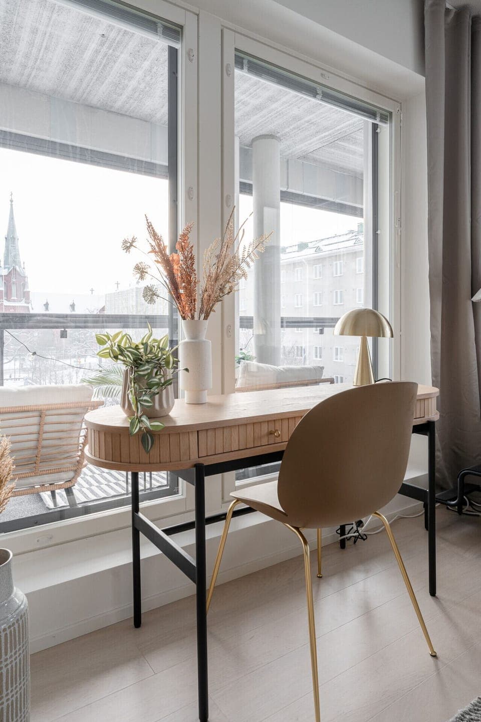 This inspiring workspace offers a peaceful spot for remote work with a direct view of the historic Alexander Church.