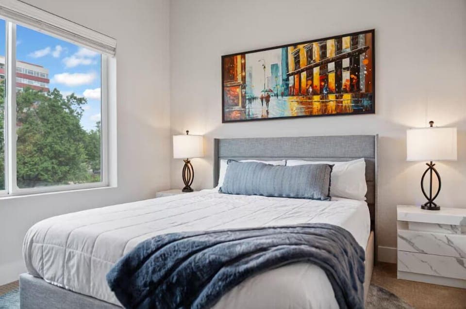 Neutral tones and contemporary artwork create a restfull vibe.