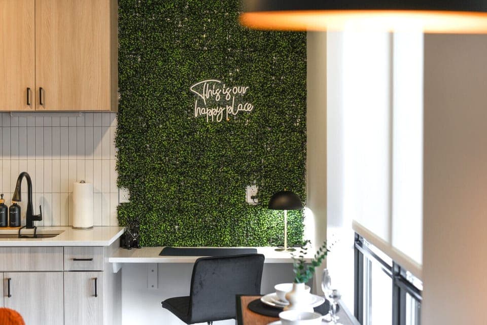 Modern dining setup with vibrant decor and cozy seating. ✨