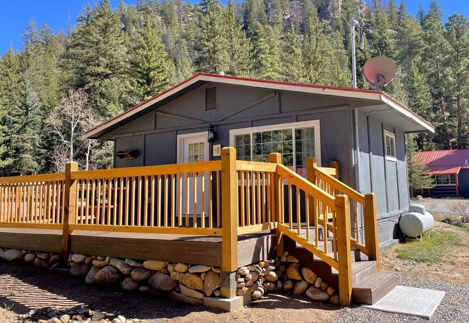 Take in the quiet mountain surroundings from the cabin exterior.