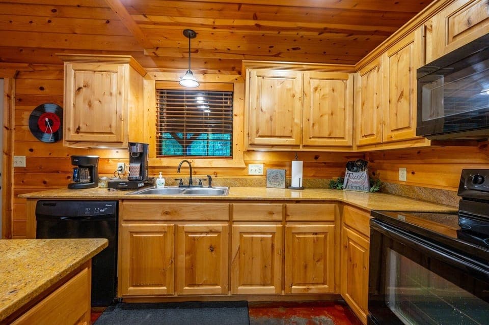 Fully stocked kitchen with dining space for gatherings