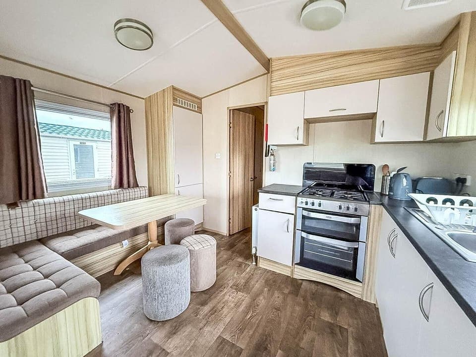 Cozy kitchen and dining nook with ample natural light