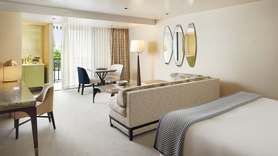 Wake gently to soft daylight and a serene sitting area.