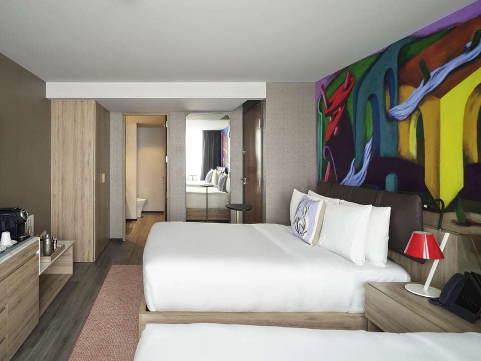 Bedroom. Exact unit will be assigned upon arrival. Views, colors and decor may vary.