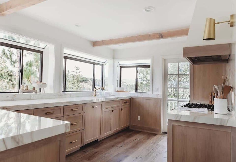 brand new kitchen where every window looks at water. The door leads to the side patio.